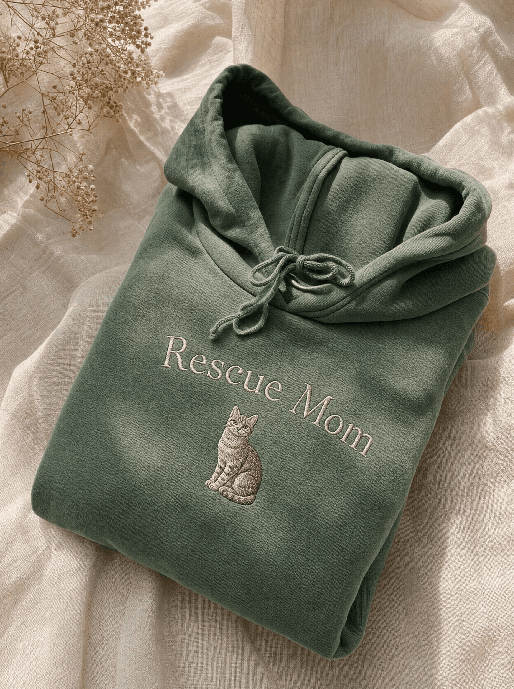 Heavy sage fleece hoodie with embroidered 'Rescue Mom' and small cat illustration
